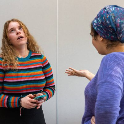 Woman reprimanding teenager about phone 5