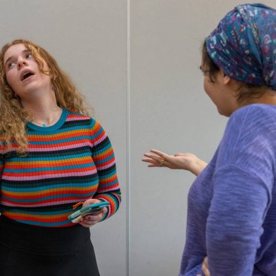 Woman reprimanding teenager about phone 6