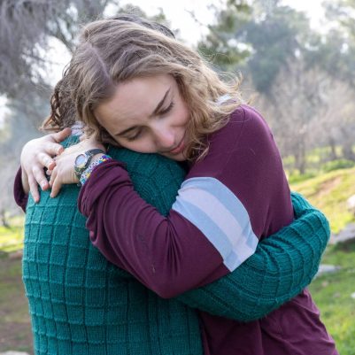 Two young women hugging 2