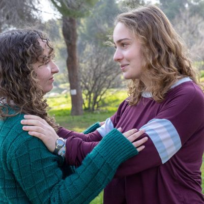 Young woman comforting friend 3