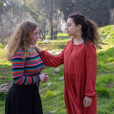 Young woman comforting friend 5