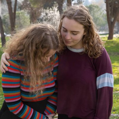Young Woman Comforting Friend 7