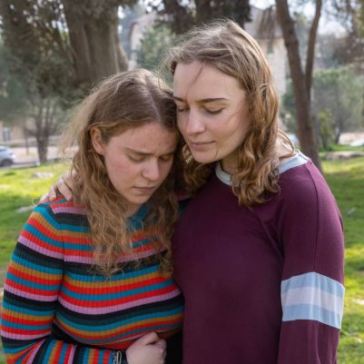 Young woman hugging crying friend 1