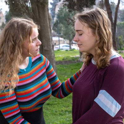 Young Woman Comforting Crying Friend 3