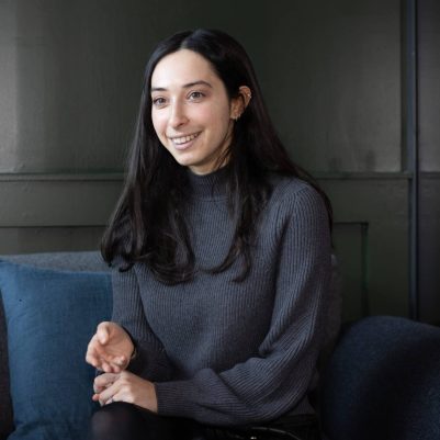 Smiling woman sitting on couch