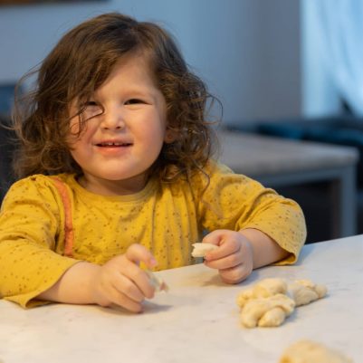 Toddler shaping challah