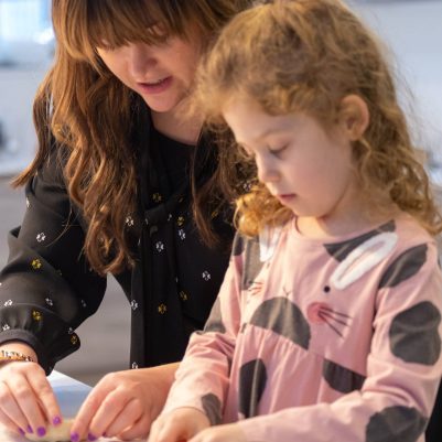 Mother and daughter making challah 6