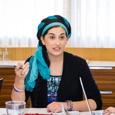 Woman leading business meeting