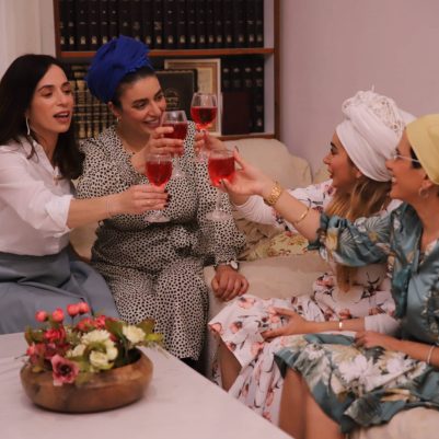 Group of women making a toast
