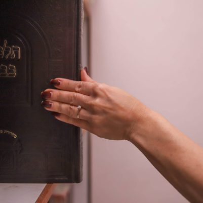 Woman holding Gemara