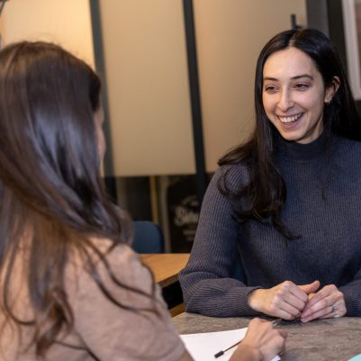 Businesswoman Listening To Colleague 3