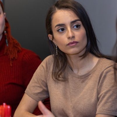 Businesswoman listening at meeting 1