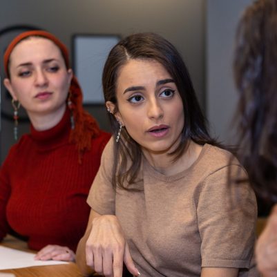 Businesswoman talking at meeting