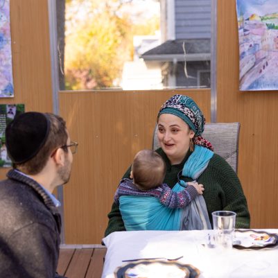 Couple talking in Sukkah 1