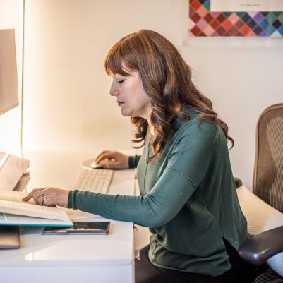 Woman working at desk 1