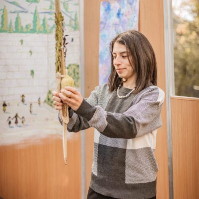 Woman shaking lulav 3