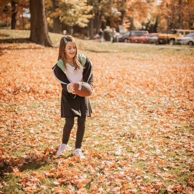 Girl playing football in park 2