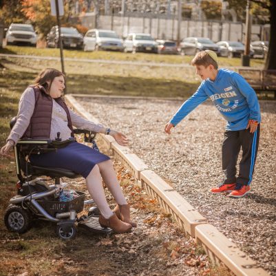 Woman in wheelchair at inaccessible park 1