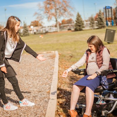 Woman in wheelchair at inaccessible park 3