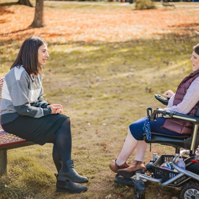 Two women talking in park 1