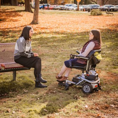 Two women talking in park 4