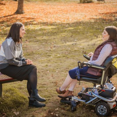 Two women talking in park 6