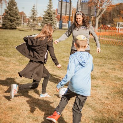 Family playing soccer 1