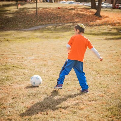 Boy playing soccer 4