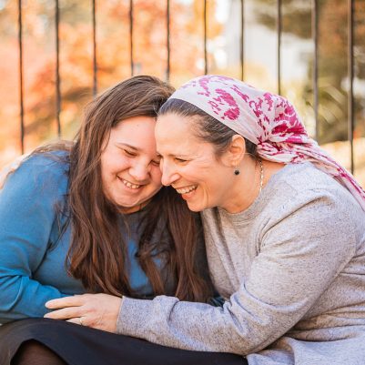 Mother and daughter laughing