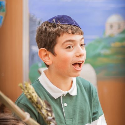 Boy holding Lulav