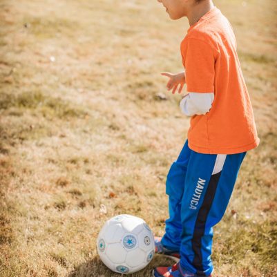 Boy playing soccer 1