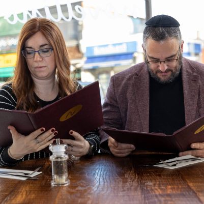 Couple looking at menu 4