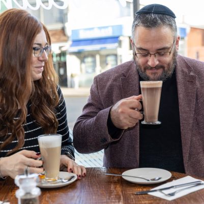 Couple drinking coffee at restaurant 1
