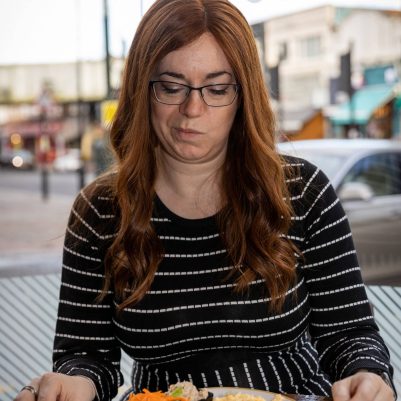 Woman disappointed in food at restaurant