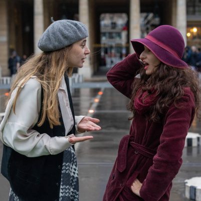 Two women talking outside in Paris 1