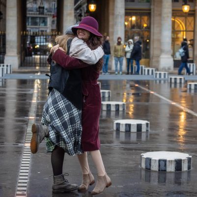Two women hugging outside la comedie francaise 2
