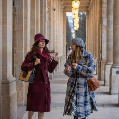 Two women walking outside la comedie francaise 2