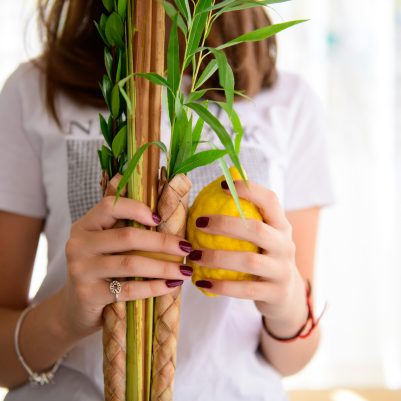 Teenager shaking lulav and etrog 5