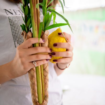 Teenager shaking lulav and etrog 7