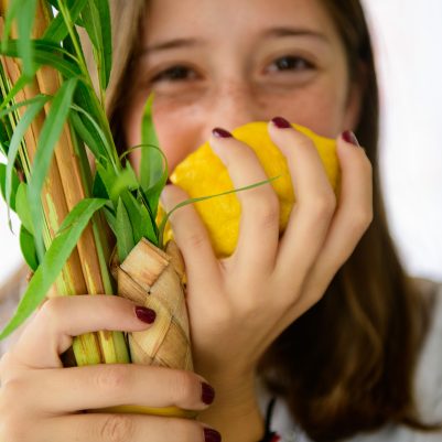 Teenager smelling Etrog 3