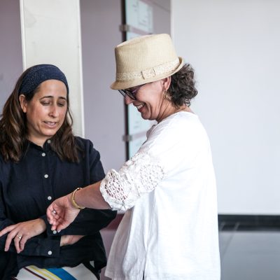 Two women waiting for elevator 1