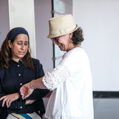 Two women waiting for elevator 1
