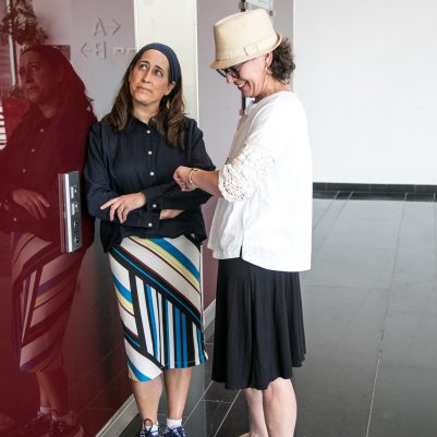 Two women waiting for elevator 4