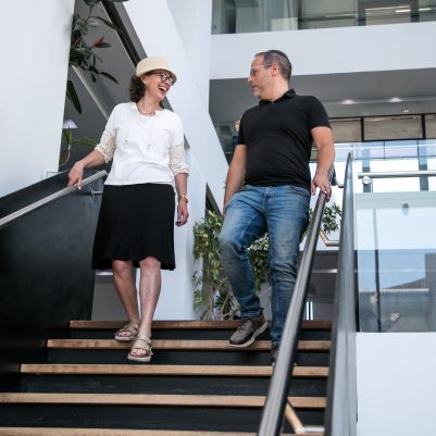 Couple walking down stairs 2