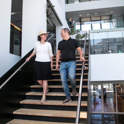 Couple walking down stairs 6