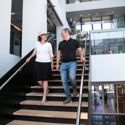 Couple walking down stairs 6