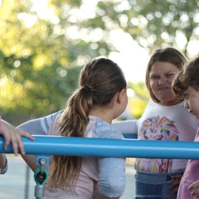 Children Having Fun on Outdoor Playground on a Sunny Day