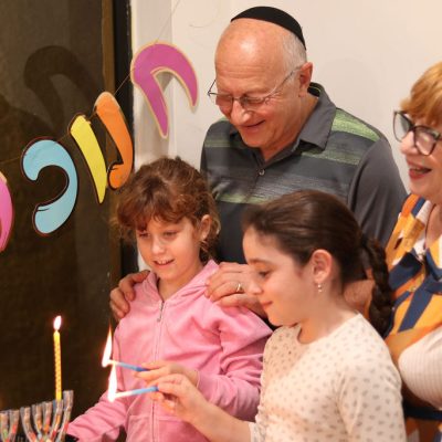 Candle Lighting With Grandparents and Children