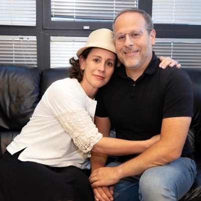 Happy Man and Woman Smiling Together