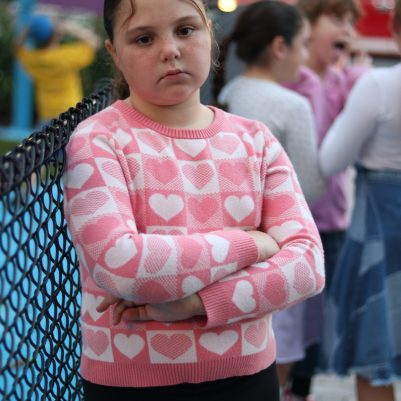 Young Girl Looking Unhappy at an Outdoor Playground